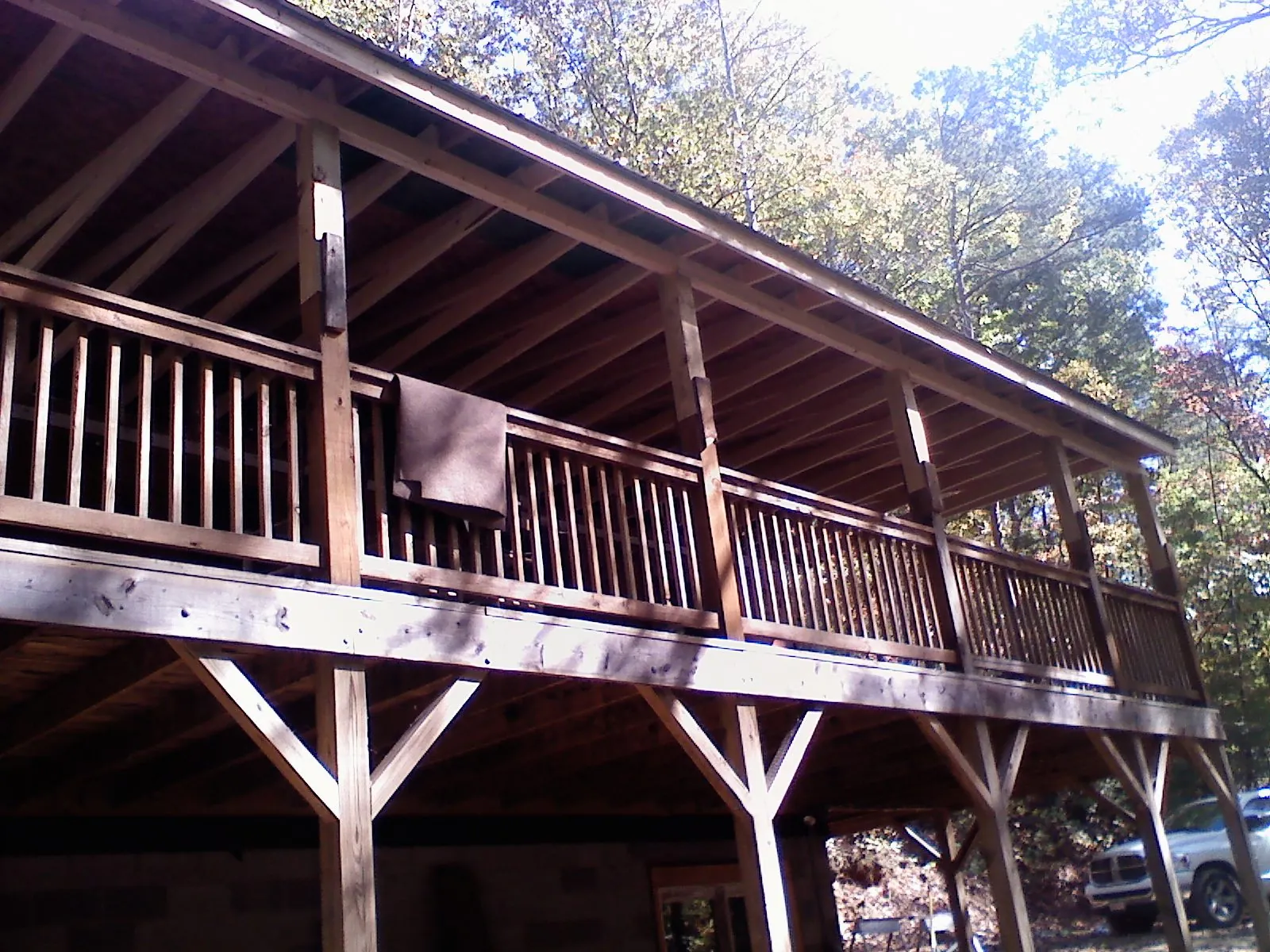 Timber framing under a new elevated porch and deck — Roof Leak Repair in Hadley by Roofing Brothers